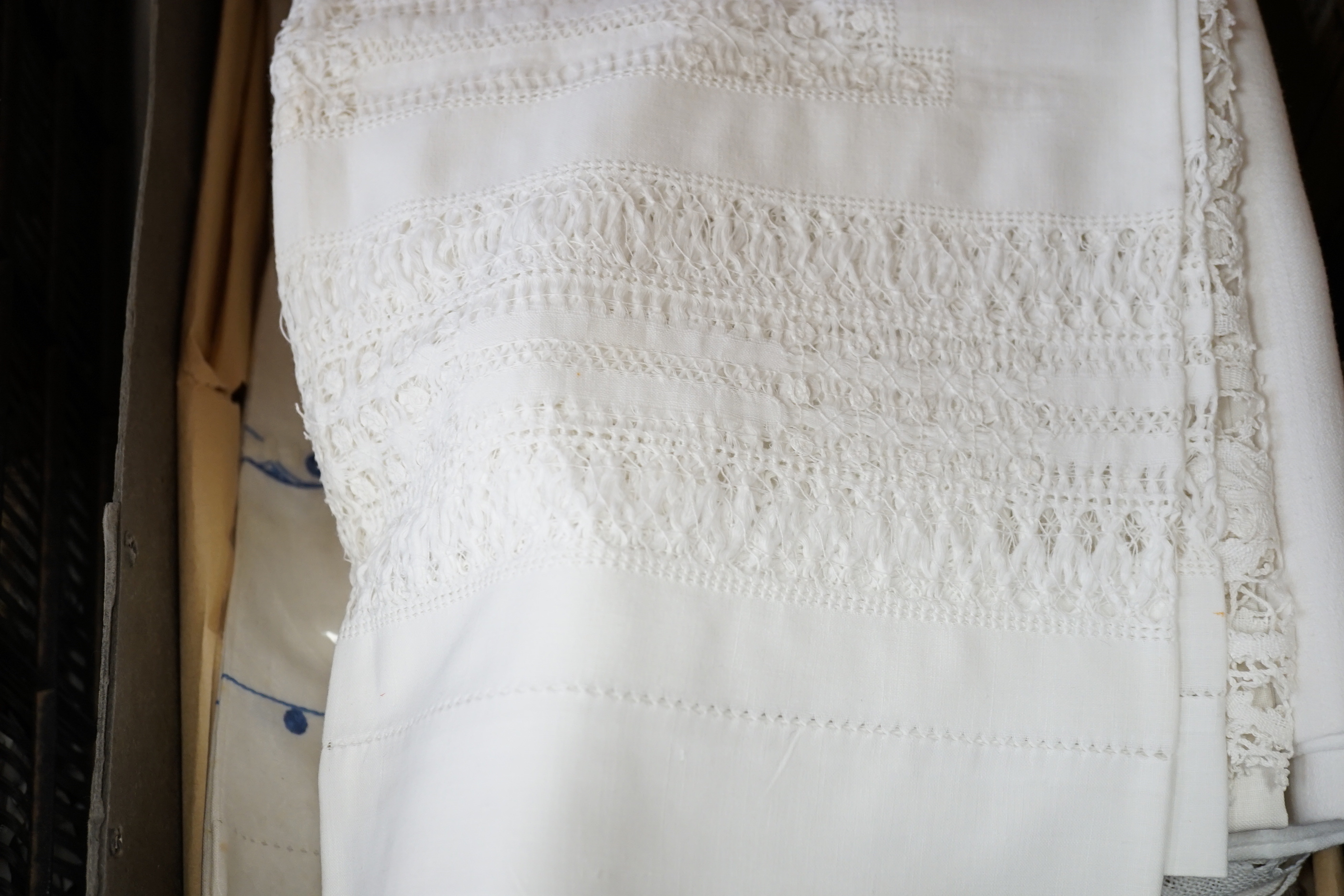 A collection of drawn thread work, cut work and damask cloths including a secessionist damask cloth and a 1920’s crewel worked cloth